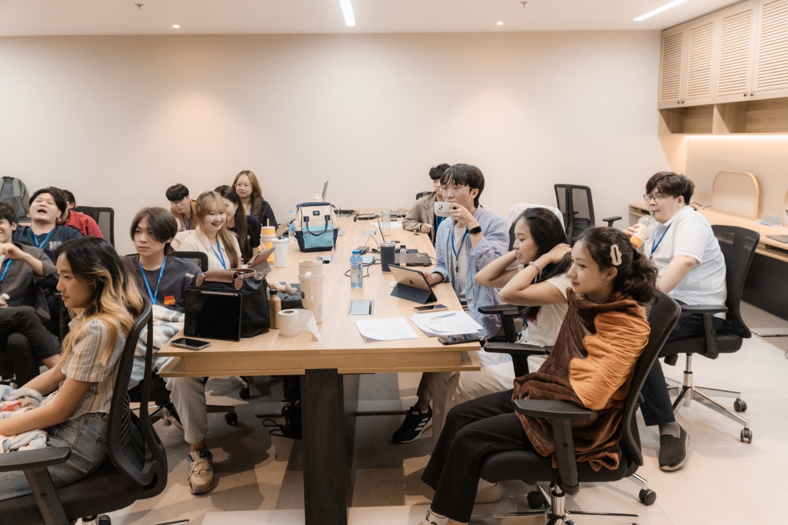 Interns learning together in a shared team session